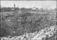 one of the 3 huge craters, the character at the bottom of the hole gives an idea of its dimension a view of the church of Asnières Acknowledgements The Mayor, the Municipal Council and the