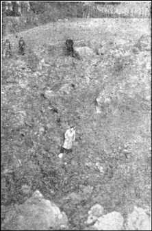 one of the 3 huge craters, the character at the bottom of the hole gives an idea of its dimension a view of the church of Asnières Acknowledgements The Mayor, the Municipal Council and the