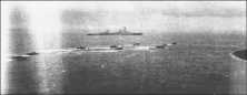 (détails) Un tir de l'"Arkansas" devant Colleville (détails) (détails) .Une tourelle de 2 canons de 305mm de l'"Arkansas" (détails) Des LCVP passent devant l'"Arkansas" (