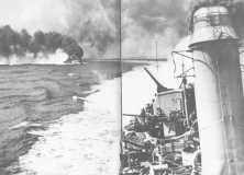 (détails) Rideaux de fumée tendus par les destroyers US pour masquer la zone de mouillage des transports. Le vent les a dissipé rapidement.