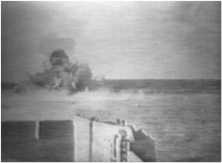 Images of the naval bombardment on Omaha Beach (from a movie, but was this film shot in Omaha Beach??) notice the vertical smoke trace of an explosion