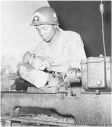 (details) Maintenance of "duck" propellers in a workshop of an amphibious truck company (Coloured Company), cad composed of black Americans with frame
